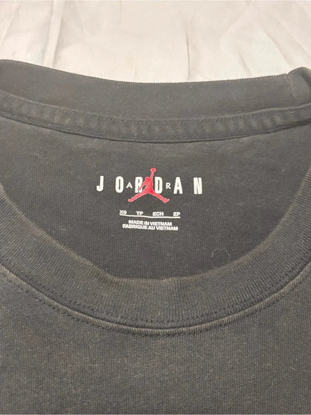 Jordan Black Tee with Red Jumpman Detail